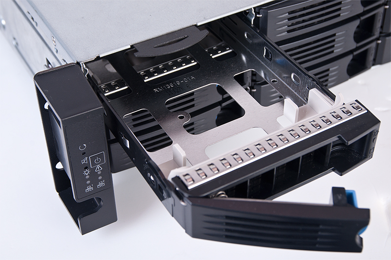 Hard drive trays with bottom venting holes